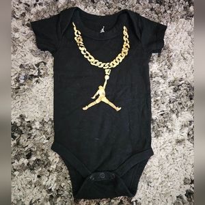 Black Bodysuit with Gold Chain Design